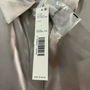 Women’s Dress Shirt. Goes well with dress pants, skirt or jeans.